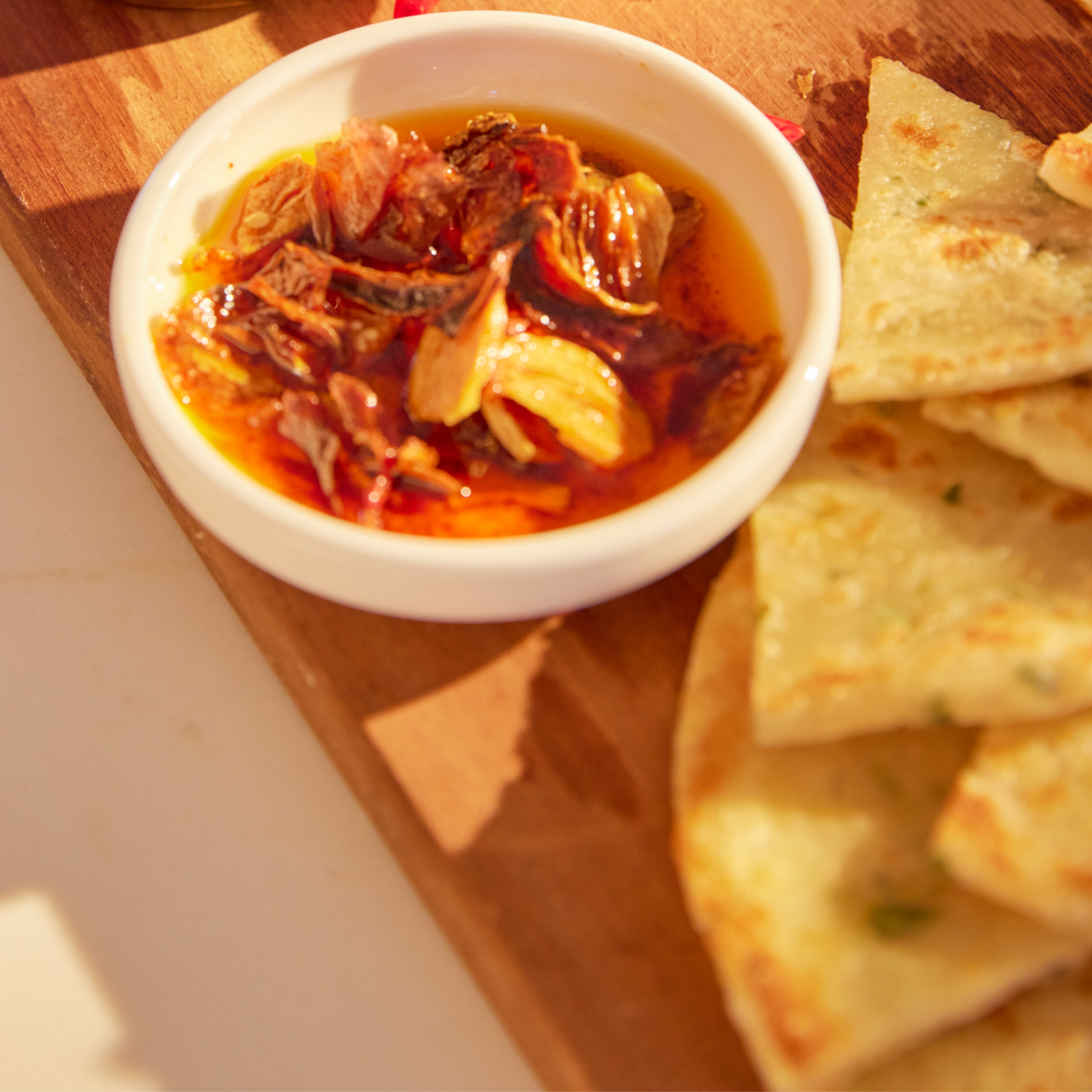 Hotgirlsauce Crunch Chili Oil with fried shallots and garlic and quesadillas